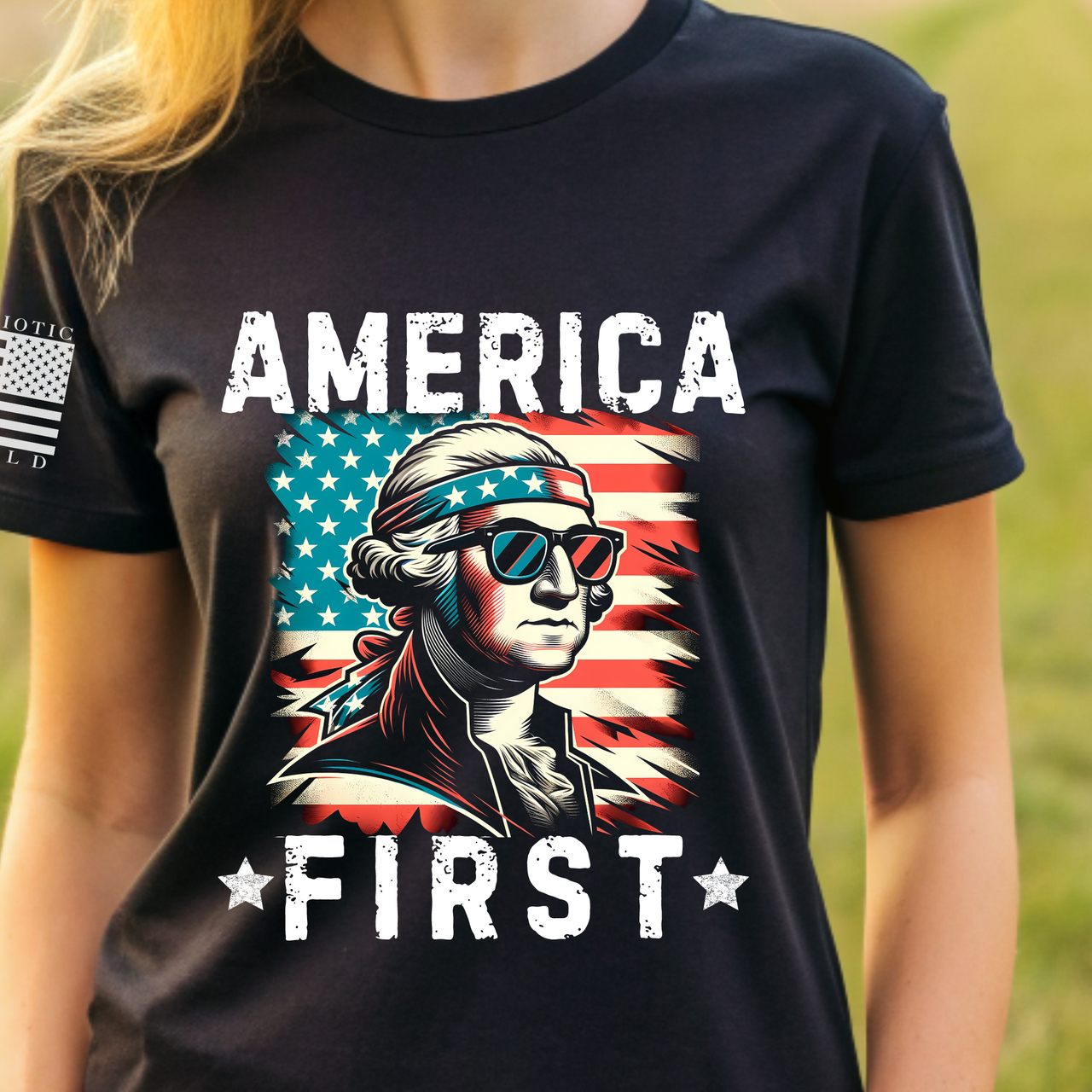 Close-up of America First design on women’s T-shirt