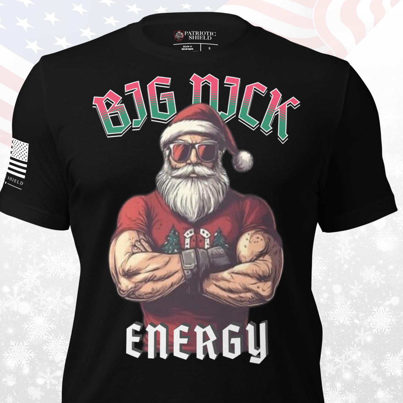 Black t-shirt with a graphic of a muscular Santa Claus wearing sunglasses and  'BIG NICK ENERGY' text.