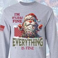 Gray long sleeve shirt with Santa Claus graphic and text 'I'm #%@&! Fine Everything is Fine' on a light blue background.