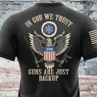 Thumbnail for in god we trust guns are just backup shirt