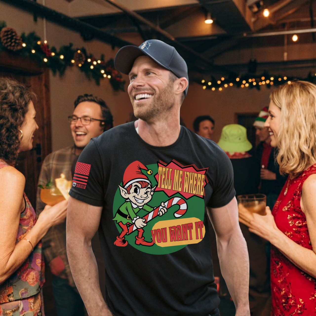 Adult Christmas humor T-shirt with cheeky elf graphic and suggestive holiday saying for fun loving americans